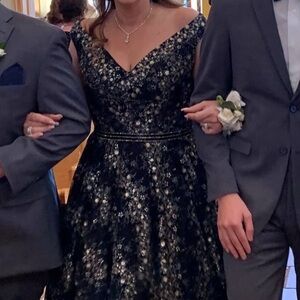 Jovani Black and Gold Gown With Black Beading.